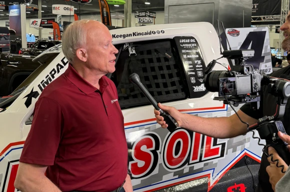 Pierre Gagnon at SEMA 2024 580x385 image of Pierre Gagnon, the CEO of Rhino Linings, getting interviewed by a camera crew at SEMA 2024 in Las Vegas, NV